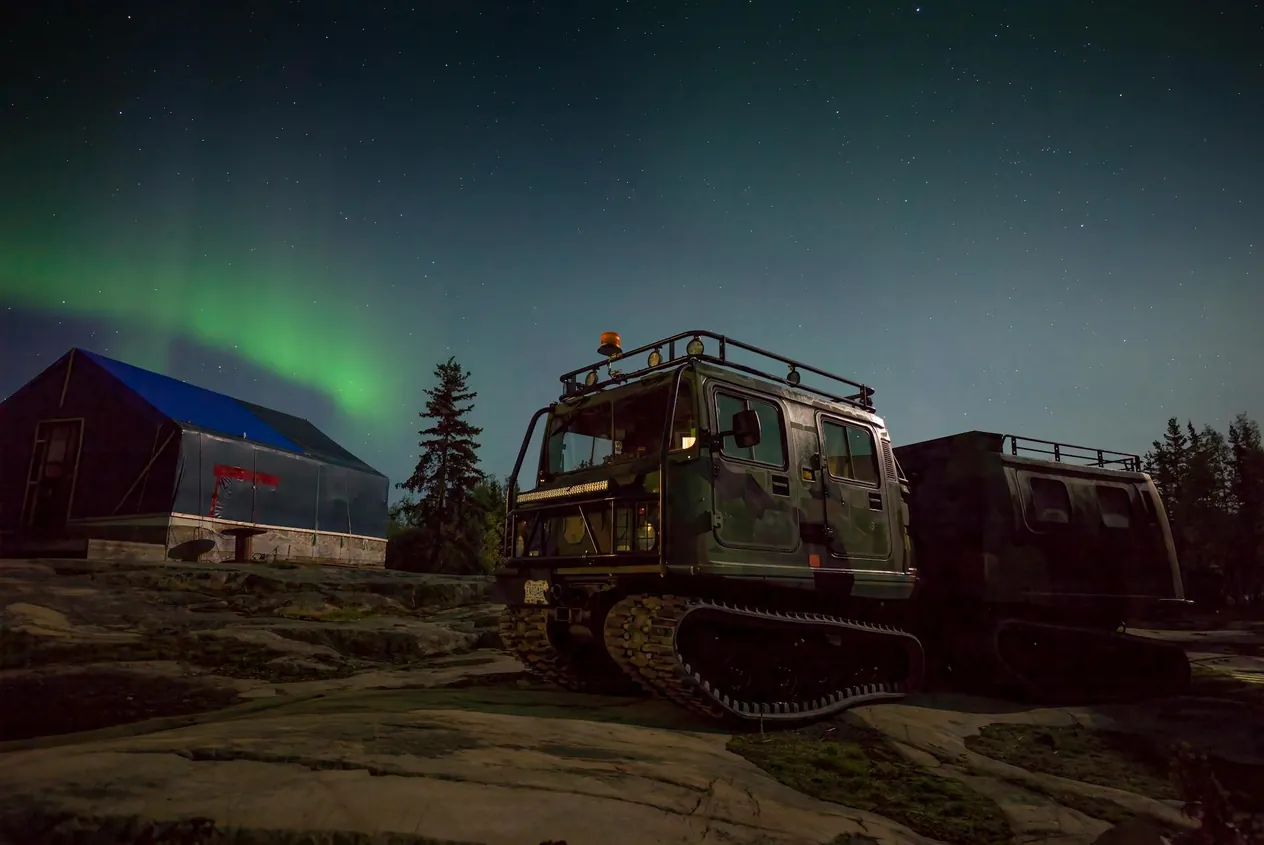 A view of the Aurora Borealis over a building in Yellowknife, Canada