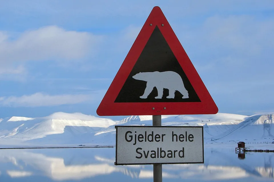 A road sign just outside Longyearbyen, Svalbard, warning of danger of meeting polar bears.