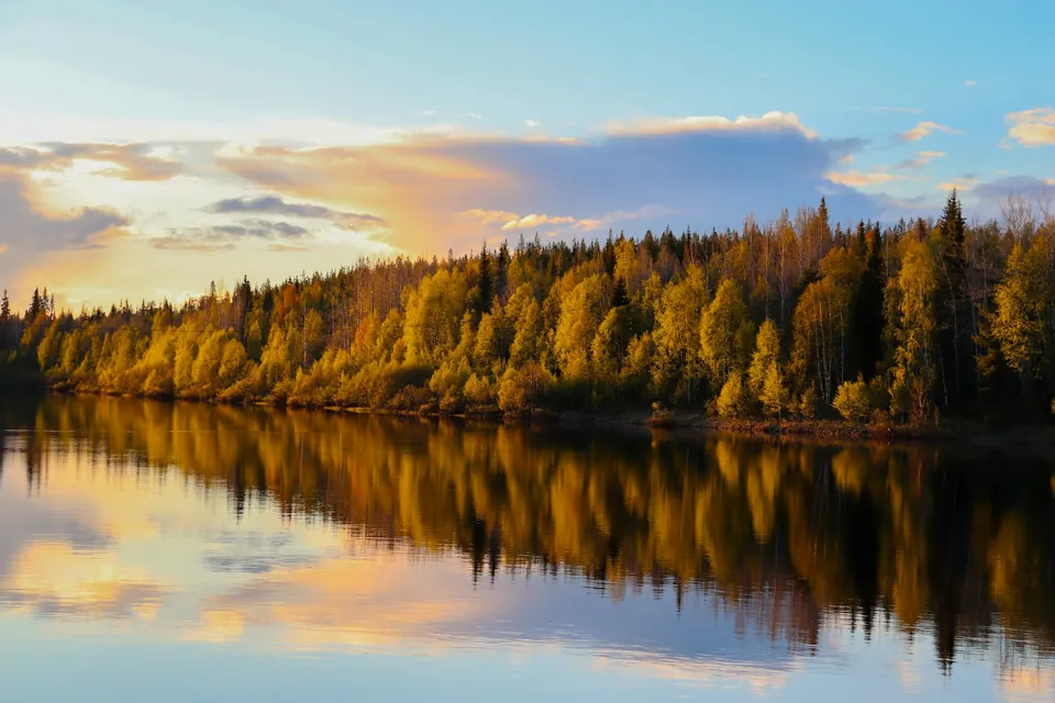 A calm lake reflecting the beautiful view of finnish nature.