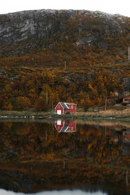 Building by Lake in Autumn