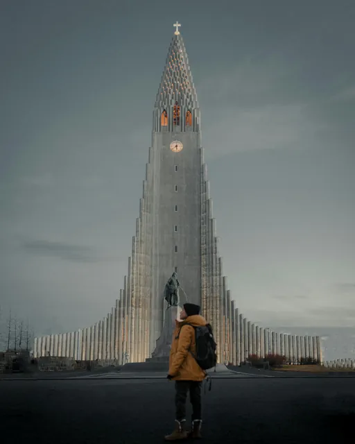 Person in Yellow Jacket and Tower