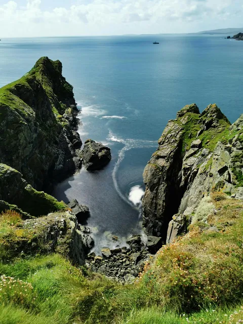 Rock Formation Beside Blue Sea