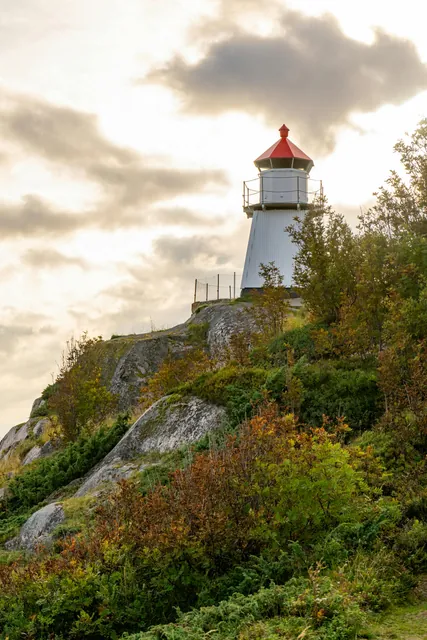 Lighthouse on Rocky Cliff