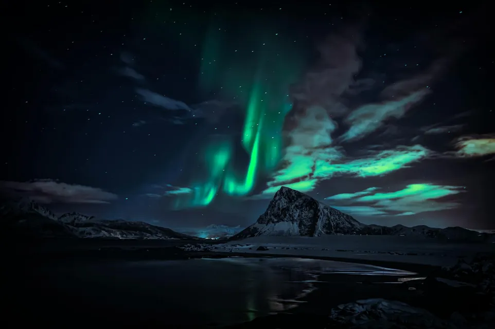 Breathtaking Northern Lights Over Norwegian Landscape