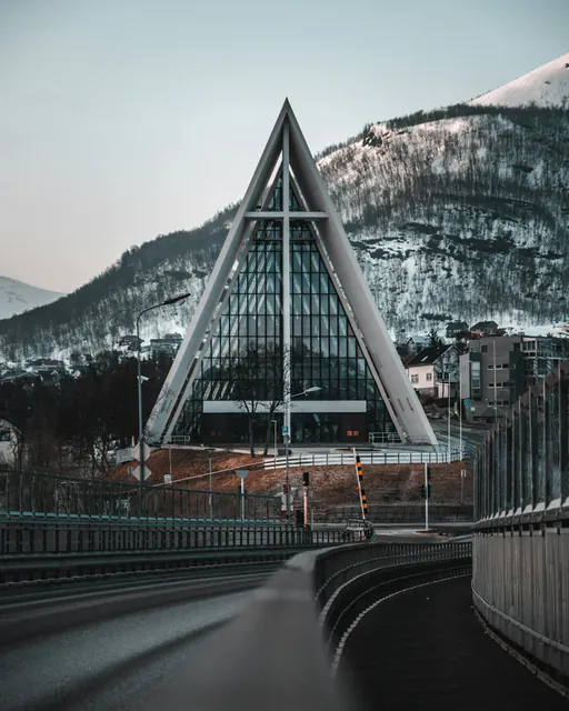 White Concrete Building Near Mountain