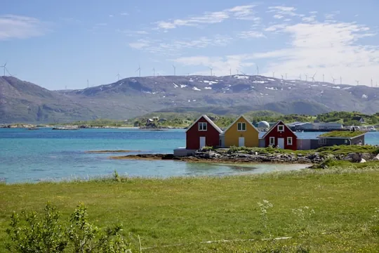 Colourful wooden buildings by the water on Sommarøy island