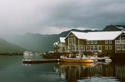 A view of Siglufjörður, Iceland with colourful buildings along the waterfront